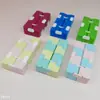 Suministro puntual de Cubo de Rubik de descompresión Juguete de descompresión de Cubo de Rubik infinito Rompecabezas Mango de descompresión de Cubo de Rubik