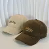 2024 otoño e invierno nuevo gorro de béisbol coreano simple para combinar con todo de lana de cordero con letra bordada cara pequeña para niños