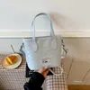 2026 Moda Nova Cesta de Vegetais Tecida de Mão Bolsa Feminina de Alto Padrão Design de Nicho Versátil Bolsa de Ombro Transversal