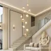 Lámpara de araña para hueco de escalera, nuevo estilo francés crema, lujo ligero, apartamento de alta gama, villa, lámpara de araña larga giratoria