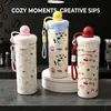 2026 Nueva Taza Térmica de Acero Inoxidable Creativa Linda Bola Flotante Dibujos Animados Taza Infantil Gran Capacidad Portátil Taza con Popote
