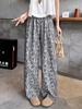 Pantalones anchos jacquard finos de algodón y lino para mujer 2025 verano nuevo estilo lino holgados efecto adelgazante drapeados pantalones nueve puntos modernos