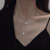 Collar de perlas elegante de acero inoxidable y titanio que no se decolora para mujer, estilo Dongdaemun de Corea del Sur, cadena de clavícula ligera de lujo estilo Chanel.