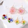 Moda transfronteiriça pequenas flores eternas frescas gota cola brincos margarida personalidade irregular amor geométrico joias pendente