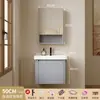 Gabinete de baño engrosado que ahorra espacio con lavabo de esquina redondeada de color crema, lavabo cerámico integrado para el baño