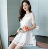 Leche de papaya verano nuevo hechizo moda coreana manga corta temperamento encaje hueco manga corta vestido corto línea A conjunto de dos piezas