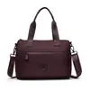 2026 de alta gama, moda nicho, bolso de hombro versátil, color sólido, bolso tote simple, bolso de mano de moda versátil