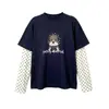 Camiseta base de manga de lunares de dos piezas falsas para niñas de otoño 2026 nueva moda coreana de algodón holgada para niños mayores