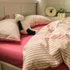 Juego de cama de cuatro piezas con estampado de algodón lavado, triangular, con rayas grises y agujas, de algodón clase A, para madres y bebés, funda de edredón y ropa de cama