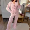 Pijama cruzado de otoño e invierno nuevo europeo y americano, conjunto de top de punto calado estampado con tirantes y pantalones largos con volantes, ropa para el hogar