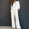 Conjunto de duas peças feminino casual para trabalho, cor sólida, gola V, manga longa e calça larga solta, de cruzamento europeu e americano, 2026
