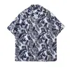 Camisa Masculina Floral Gola Padre 2026 Novo Estilo Coreano Solta Moda Estampada Estilo Praia Casual Manga Curta Exportação