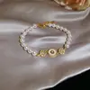 ¡Manta Rose! Pulsera de Flor de Circonita Redonda y Perla, Elegancia Suave Estilo Francés, Joyería de Lujo Ligero y Sensación de Alta Gama
