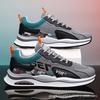 Zapatos de viaje 23 primavera nuevos zapatos para correr de moda casual para hombre con suela suave con cámara de aire, superficie de malla tejida con mosca, tenis de moda
