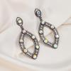 Pendientes geométricos de gran venta transfronterizos europeos y americanos, con gotas de agua antiguas exageradas y diamantes huecos, pendientes metálicos vintage.