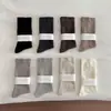 Calcetines sin costuras para mujer, engrosados y de caña alta para primavera y otoño, calcetines holgados para maternidad, calcetines holgados de color liso versátiles estilo japonés, calcetines largos Maillard