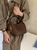Bolso de cubo de nicho nuevo transfronterizo 2026, versátil y elegante, bolso de hombro y bandolera, bolso de mano con cadena, bolso vintage para madre e hija