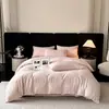 Juego de cuatro piezas de algodón lavado jacquard de lujo, funda de edredón de algodón suave para la piel, nuevo modelo 2026, sensación de alta gama, ropa de cama de 1.8m