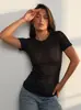 2026 Nova Camiseta de Manga Longa com Estampa de Flocos de Neve Estilo Europeu e Americano para Mulheres, Fina de Verão, Translúcida, Gola Redonda, Caimento Solto, Camisa Básica Elegante
