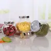 Fabricante de Frascos de Vidrio para Envasado de Alimentos Venta al por Mayor en Stock Botella de Vidrio Tipo Tambor Plano 100ml Botella de Vidrio para Miel y Mermelada