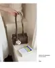 Bolso Boston versátil de color sólido para nicho para mujer, nuevo modelo de verano 2026, bolso de hombro/axila de gran capacidad para el trabajo, tipo bowling