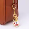 Chaveiro de Coração de Cereja da Moda de Luxo Leve Transfronteiriço para Mulheres, Pingente de Bolsa e Carro, Acessório Requintado, Presente para Melhor Amiga