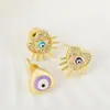 Nuevos aretes de moda para mujer con forma de corazón y ojo de diablo, aretes de temperamento y personalidad, joyería al por mayor, ventas directas