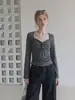 Camiseta de manga larga a rayas ummoimoi para mujer, nuevo estilo de otoño con diseño retorcido, única y de nicho, adecuada como top de capa base