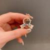 Nuevo clip de metal Dongdaemun de tamaño pequeño con incrustaciones de diamantes, elegante flequillo con clip lateral y temperamento.
