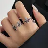 Anillo único vintage con flor de iris cruzada desgastada para mujer, nuevo anillo abierto versátil de alta gama retro totalmente pavonado con diamantes para mujer