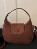 Bolso de mano pequeño retro Yaozi para mujer, nuevo estilo 2026 bolso de mano con forma de media luna, bolso de hombro versátil y simple, bolso de axila tipo empanadilla