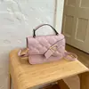 Bolso cuadrado pequeño de moda transfronterizo de nicho para mujer, nuevo bolso de hombro con patrón de diamantes de color sólido para otoño 2026, bolso cruzado para el día a día