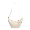 Bolso de mano coreano de nicho transfronterizo tipo bolsa de dumplings para mujer 2026 Otoño nuevo bolso de hombro literario simple bolso cruzado para ir al trabajo