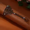 Nueva moda en joyería incrustada de diamantes, pulsera y anillo de cadena integrada de lujo ligero europeo y americano, pulsera de muñeca de estilo de lujo ligero exquisito