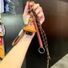 Llavero de pan alcalino colgante pequeño croissant bagel creativo colgante para mochila escolar regalo de graduación regalo pequeño