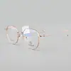 Óculos de aro completo em titânio puro, óculos de aro completo modernos em formato oval para homens e mulheres, lentes lisas, podem ser equipados com lentes de grau para miopia, disponíveis para atacado
