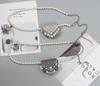 Bolso mini francés de nicho para otoño e invierno para mujer 2021 nuevo moderno personalizado diamante brillante bandolera cadena de perlas