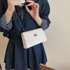 Nuevo Bolso de Mano para Mujer 2026 con Diseño Horizontal Texturizado, Bolso Cuadrado Pequeño con Cadena Estilo Coreano y Japonés, Bolso Cruzado de Moda Versátil para el Día a Día
