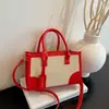 Nova bolsa de ombro color block popular para o início do outono de 2026 para mulheres, bolsa de mão casual da moda, bolsa elegante para o dia a dia, bolsa feminina no atacado