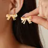 Pendientes de Plata con Pliegues Metálicos y Lazo Transfronterizos Europeos y Americanos, Pendientes Simples de Nicho de Moda de Alta Gama Retro para Mujer