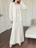Conjunto de cárdigan tejido y falda larga para mujer, nuevo estilo otoño e invierno 2026, color liso, holgado, casual, moderno, conjunto de tres piezas
