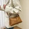 Bolso de mano de gamuza de alta gama, estilo vintage, para mujer, nueva colección otoño/invierno 2026, moderno y versátil, adecuado para el uso diario y para ir al trabajo, bolso cruzado