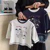 Camiseta de algodón puro para niños, modelo primavera y otoño 2026 para bebés y niños pequeños, top de dibujos animados graffiti estilo ins, camiseta interior de manga larga para niños