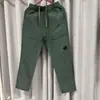 Fábrica Cp Calças de Nylon em Estoque Bolso da Empresa Lente Moda de Rua Calças Casuais