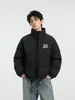 Chaqueta de algodón para hombre con cuello mao, corte holgado, nuevo estilo invierno 2026, simple y versátil, con un toque de alta gama, sin capucha, proporcionando calidez