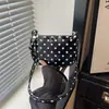 Bolso de alta gama para mujer 2026 verano nuevo bolso de axila para el trabajo diseño de nicho simple y moderno bolso de hombro cruzado