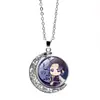 Cazador de demonios: Kimetsu No Yaiba Kamado Nezuko Collar de Luna Giratoria Periférico de Anime Colgante Giratorio de Doble Cara Cadena para Suéter
