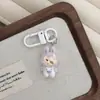 Pantalones de tela con botón blanco I37 tela tela llavero lindo muñeco colgante llavero elfo bolsa colgante regalo