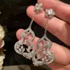 Pendientes Colgantes de Flor de Calabaza con Circonita de Aguja Plateada Super Brillantes Exquisitos de Lujo Ligero Clavos de Oreja de Gama Alta Nuevos Pendientes de Moda China