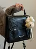 Mochila casual trendy estilo universitario 2026 versión coreana para mujer, moderna y elegante para ir al trabajo y viajar, mochila pequeña y bolso de mano para mujer
